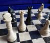 Подарок 3184 / Каменные шахматы 40х40 см. черный оникс - яшма